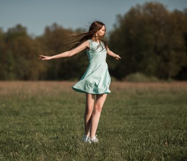 A happy lady in the field